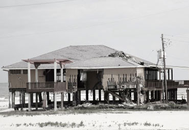 Wind damage - spray foam can help prevent uplift to Corpus Christi roofs